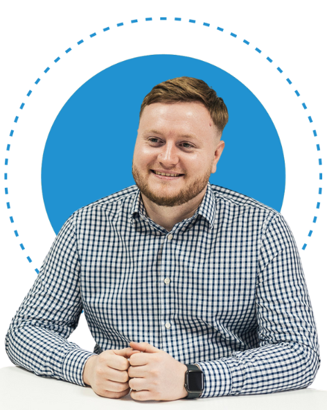 Man Smiling at desk