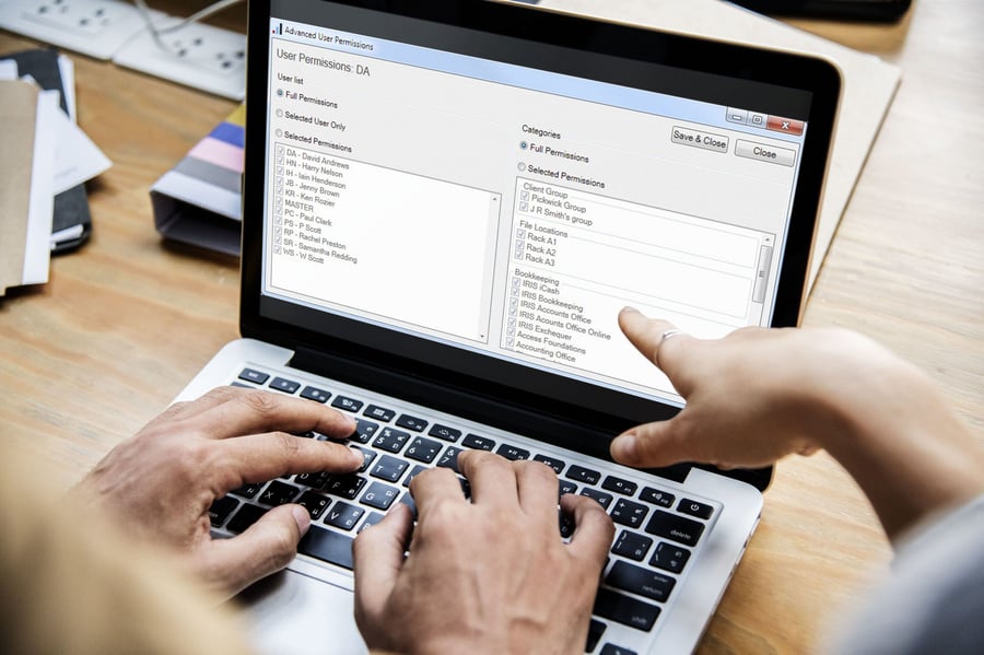 Exchequer software displayed on laptops