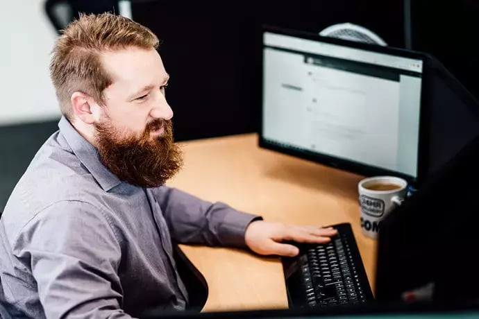 Rich-At-Desk-IT-50-50